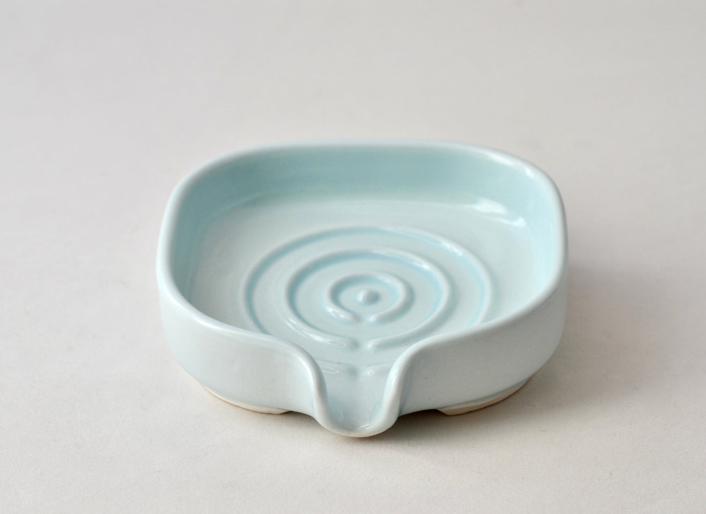 Porte-savon en porcelaine auto-drainant