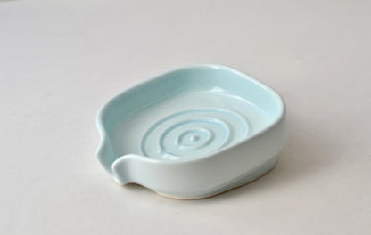 Porte-savon en porcelaine auto-drainant